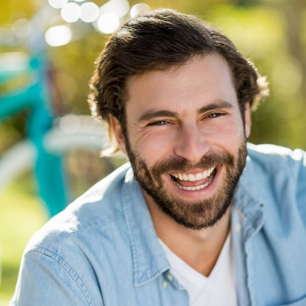 happyyoungadultmanlaughing